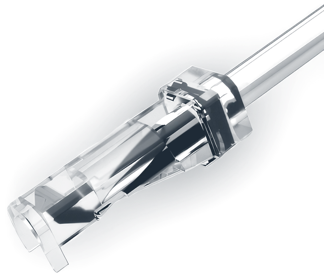 Close-up of the clear safety shield enclosing the needle tip