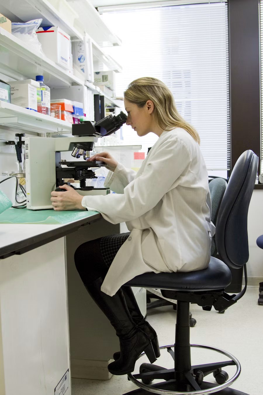 Portrait of a team member in a lab coat