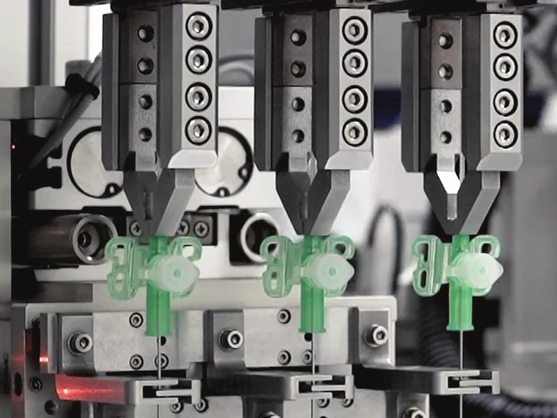 Automated grippers assembling catheter hubs